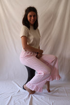PANTALON RAYÉ ROSE ET BLANC - à volants